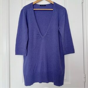 100% cashmere purple v-neck sweater with 3/4 length sleeves size medium to large